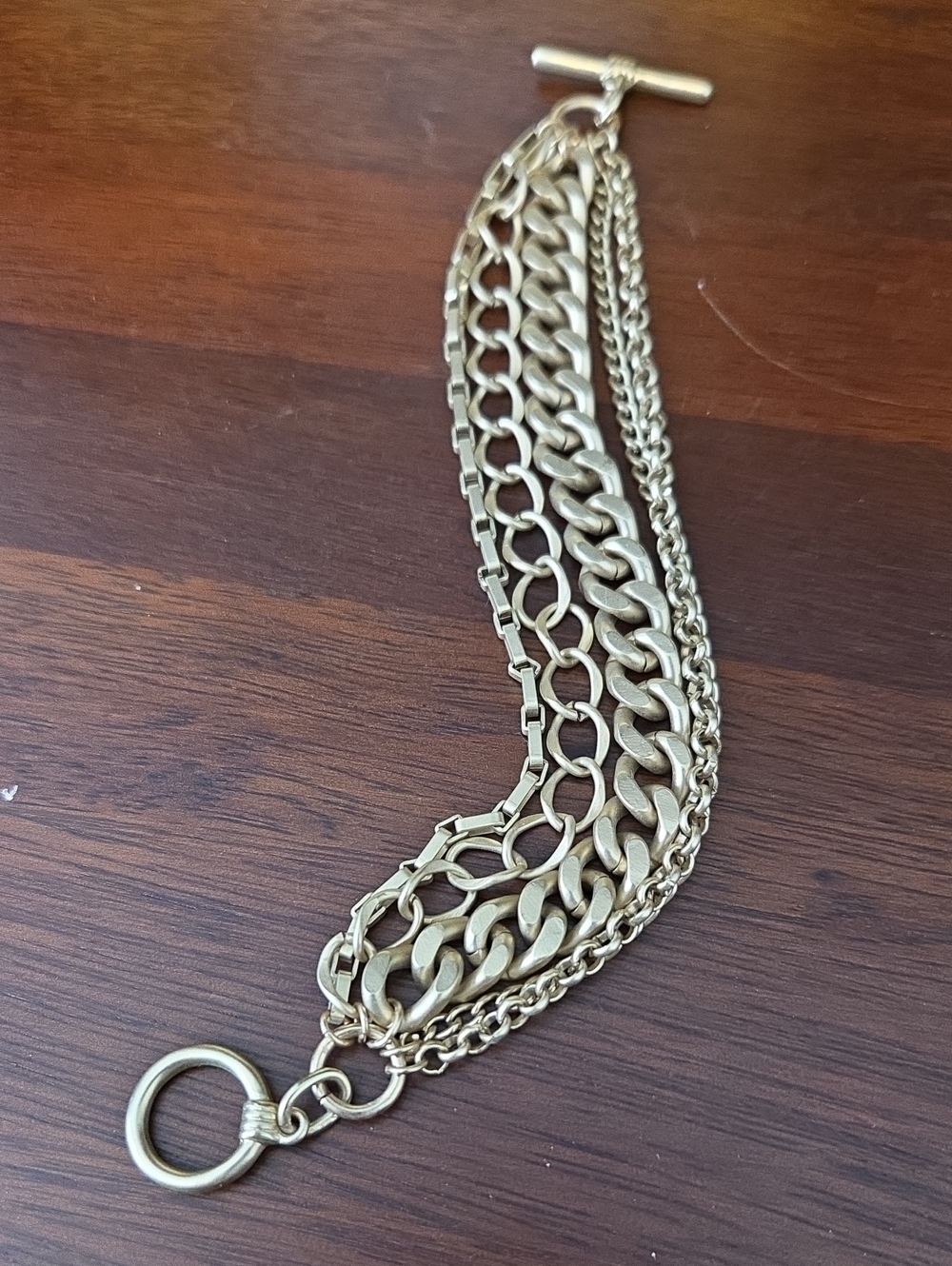 Multi-Row Brushed Goldtone Various Chain Toggle Bracelet - 7inch